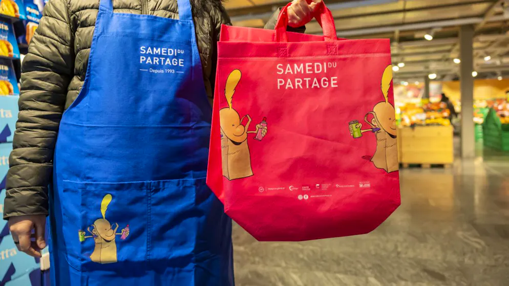 Les bénévoles du Samedi du partage accueilleront les clients à l'entrée des magasins (archives).