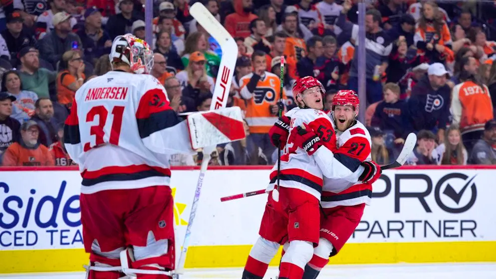 Winning goal scorer Jackson Blake is embraced by teammate Nikolaj Ehlers