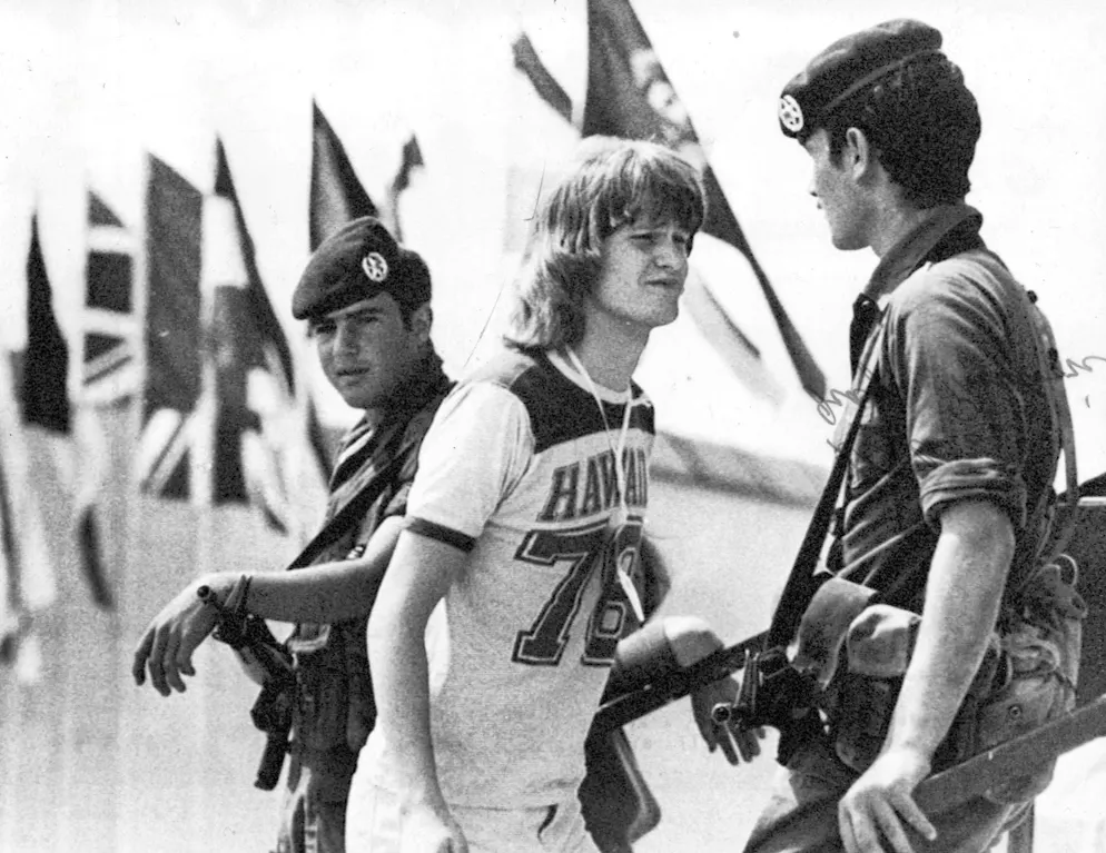 Swedish artist Ted Gärdestad passes security forces in Jerusalem in 1979 as he goes to the rehearsals. Seven years earlier, eleven Israelis had been killed in the Munich Olympic bombing.