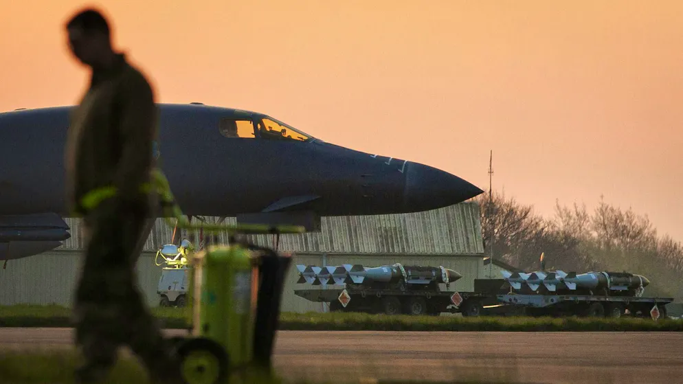 A US Rockwell B-1 Lancer bomber at RAF Fairford base in Gloucestershire, England, on April 8. In the background, JDAM bombs are ready for use.