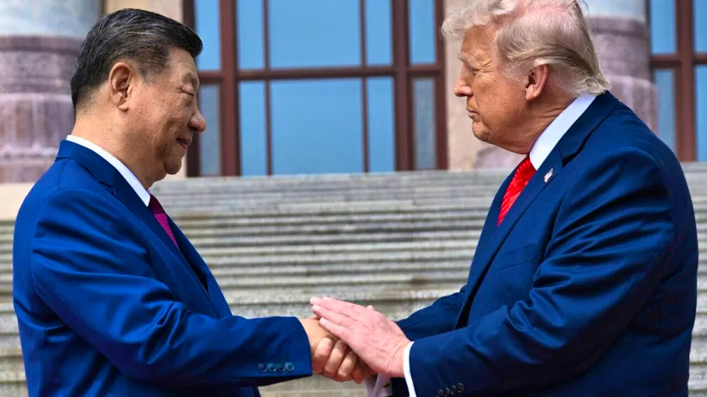 dpatopbilder - Chinese President Xi Jinping shakes hands with US President Donald Trump at the Great Hall of the People. Photo: Kenny Holston/Pool The New York Times/AP/dpa