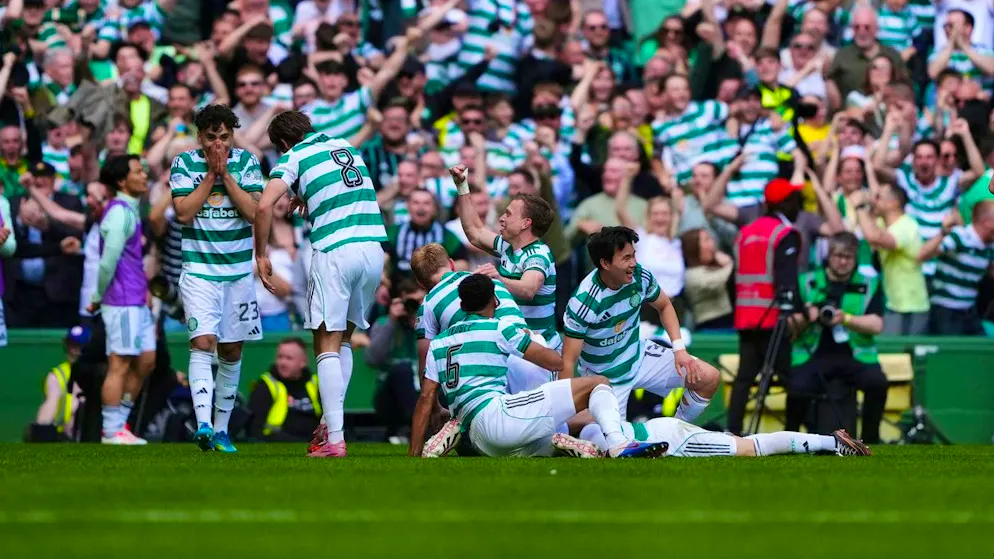 Daizen Maeda (left) fires Celtic Glasgow to the league title (archive image)
