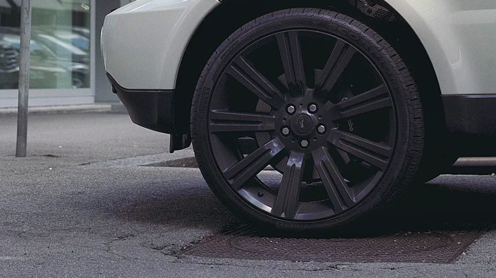 Combination lock hung on rim. Revenge on wrong-way parker costs man dearly