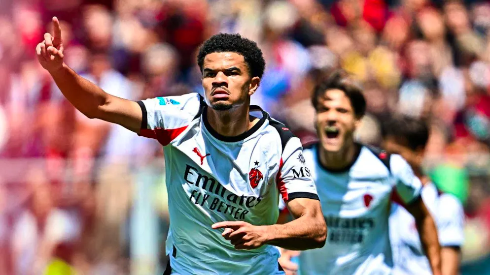 Zachary Athekame scores Milan's second goal of the season in AC Milan's 2-1 win in Genoa.