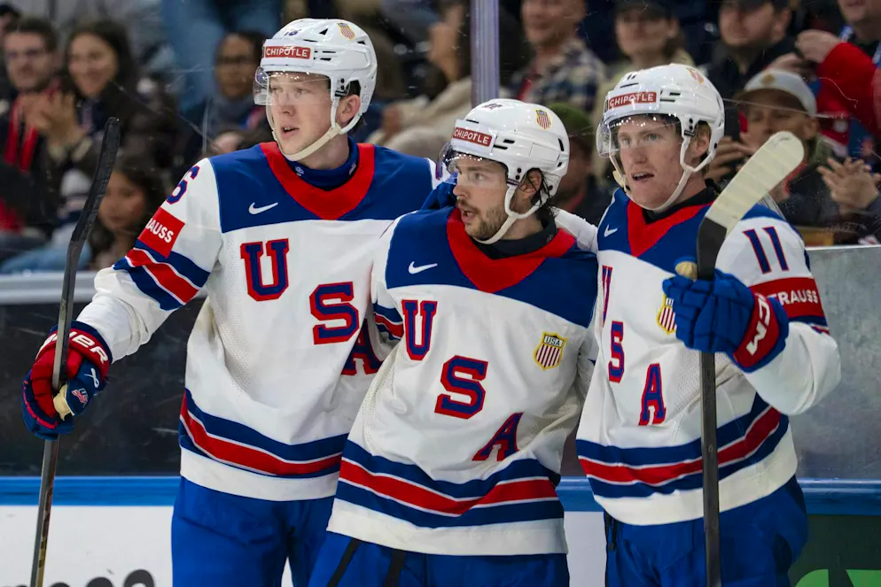 The reigning world champions celebrate their first win in their 2nd game.