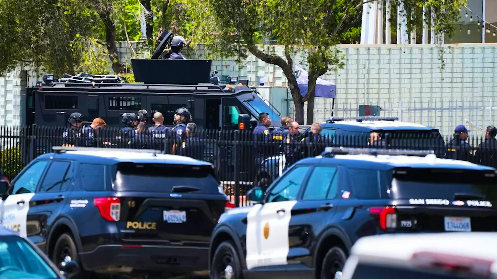 Police respond with a large force to reports of gunfire at an Islamic center in San Diego.