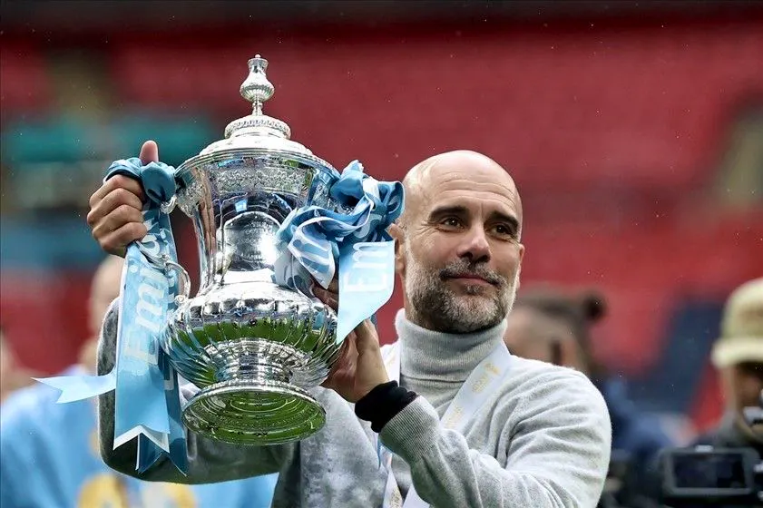 Calcio. Guardiola via dal City
