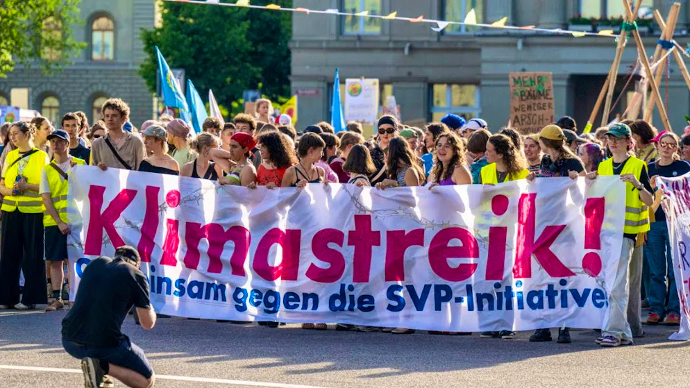 Friday's climate strike rally was directed against the SVP's immigration initiative.