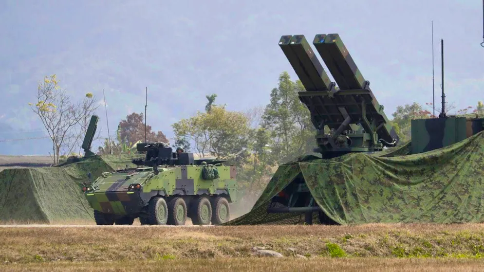 ARCHIVE - An armored vehicle drives past a multiple rocket launcher during a military exercise in Taichung County, Taiwan. (to dpa: "USA: Arms sales to Taiwan "paused"") Photo: ChiangYing-ying/AP/dpa