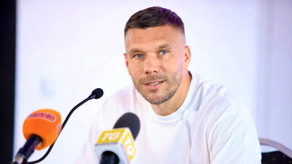 Lukas Podolski speaks at a media conference in Zabrze on Thursday.