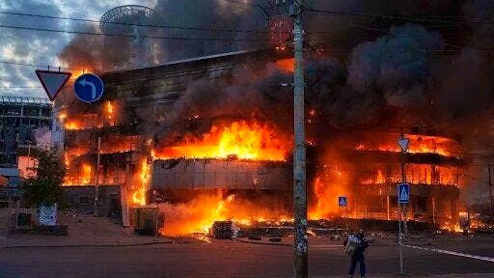 A burning commercial center after the Russian attack on Kiev.