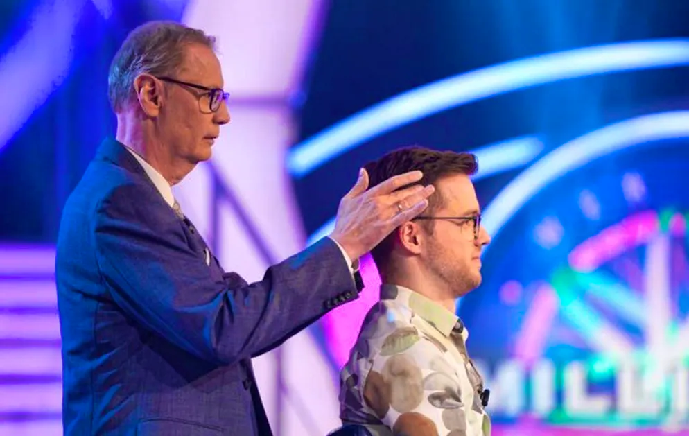 The quizmaster's temple massage unblocked contestant Maximilian Frank, who won 64,000 euros.