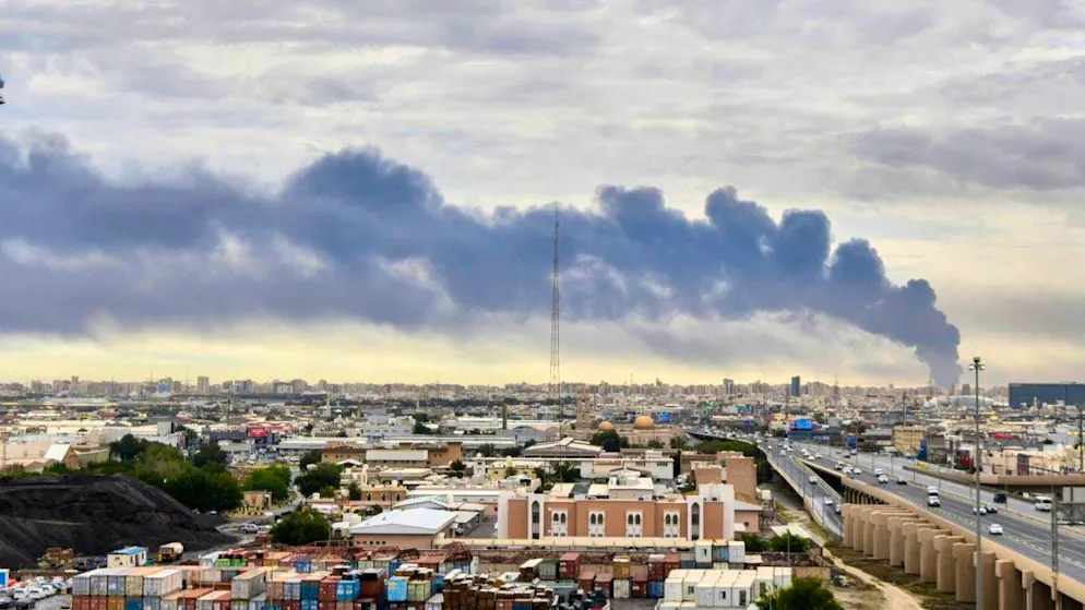 ARCHIVE - Smoke rises from Kuwait International Airport after a drone attack on a fuel depot. Photo: Uncredited/AP/dpa