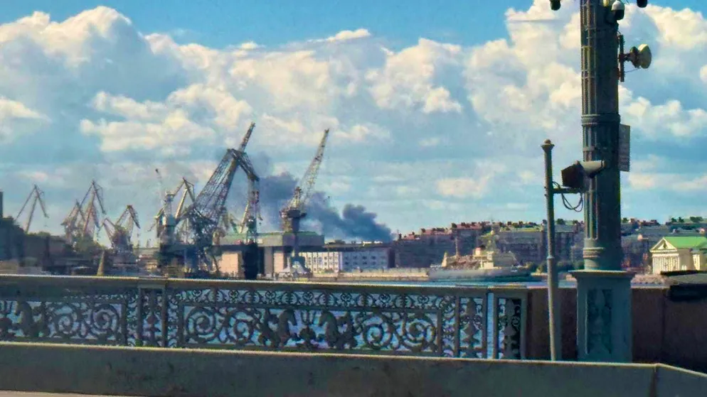 Smoke rises in the port of St. Petersburg, Russia. Photo: Ulf Mauder/dpa