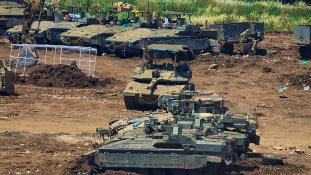dpatopbilder - Israeli troops gather at the border with Lebanon. Photo: Ariel Schalit/AP/dpa