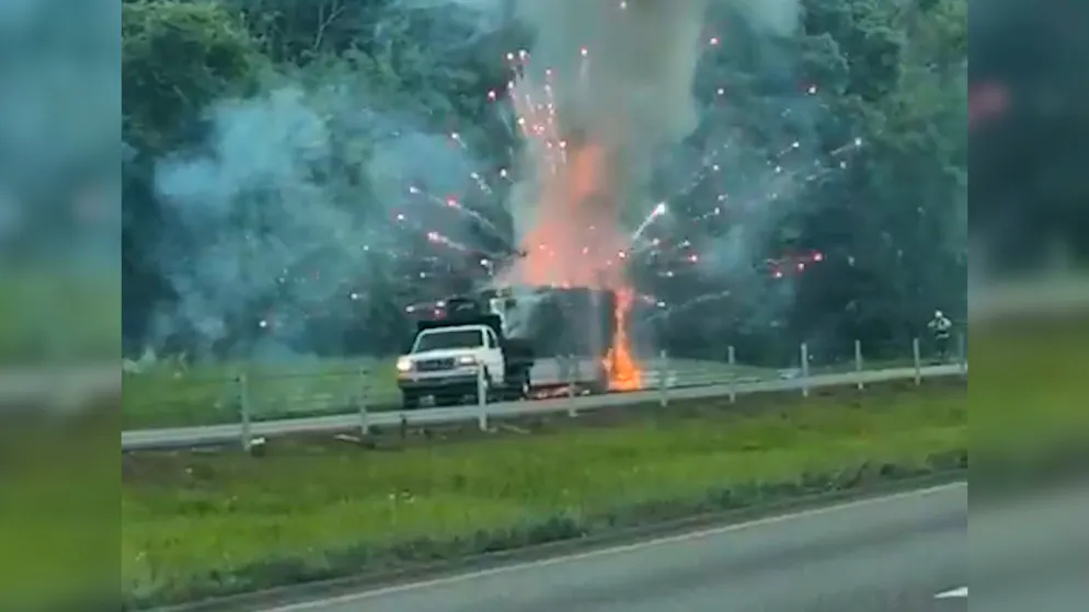 Truck goes up in flames. Spectacular explosion on highway - fireworks detonate in the middle of traffic