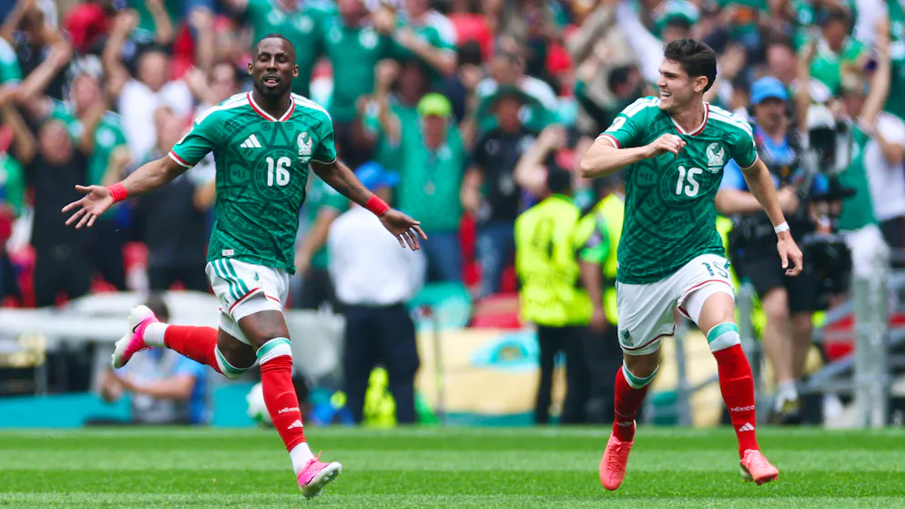 Ecstasy at Azteca Stadium. Mexican Quinones scores his first World Cup goal
