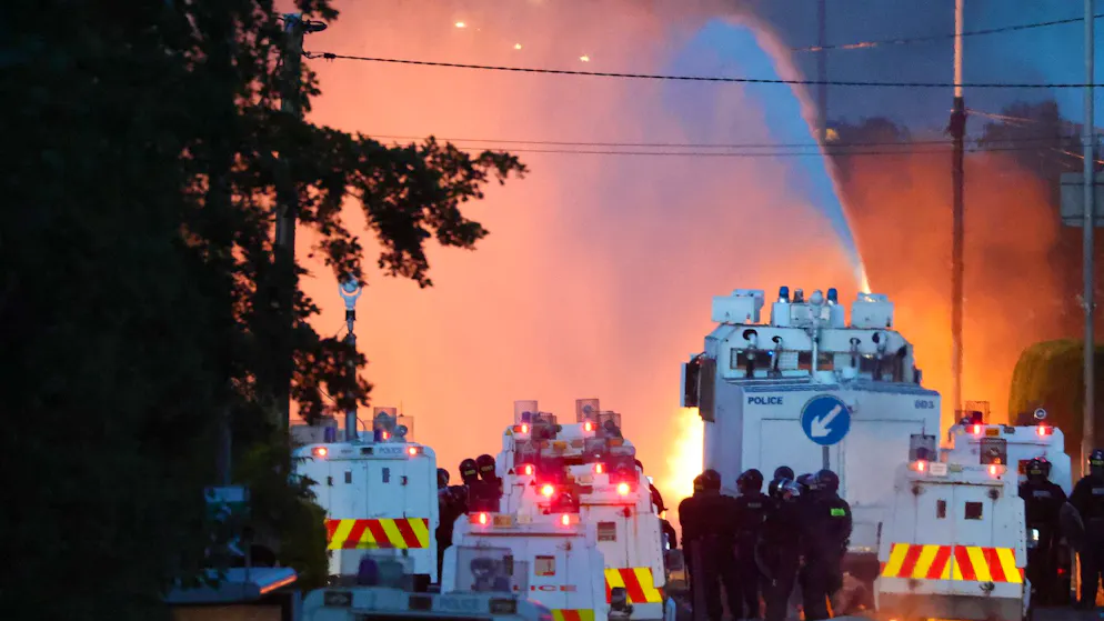 Riots following a knife attack. Police in Northern Ireland use water cannons against rioters