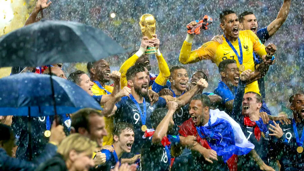 In the pouring rain of Moscow, France celebrates its 2018 World Cup title.