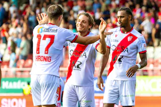 Jan Kronig (SIO)), left,Numa Lavanchy (SIO), centre, and Noe Sow (SIO), right, celebrate their victory after defeating Vaduz, during the Super League soccer match of Swiss Championship between FC Sion, SIO, and Vaduz, FCV, at the Stade de Tourbillon in Sion, Switzerland, Sunday, August 9, 2026. (KEYSTONE/Salvatore Di Nolfi)