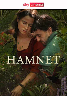 Filmplakat zu «Hamnet» mit einer Frau und einem Mann, die eng beieinander zwischen Pflanzen sitzen.